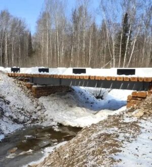 У деревни Куркули в Мариинском округе отремонтировали мост